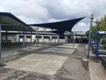Comshade XTRA Shade Sails installed for Springfield Central High School Colour is Navy Blue